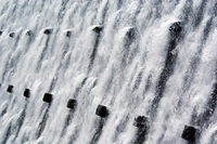 Cascade: is where water systematically drops over a series of surface materials by way of force or gravity.